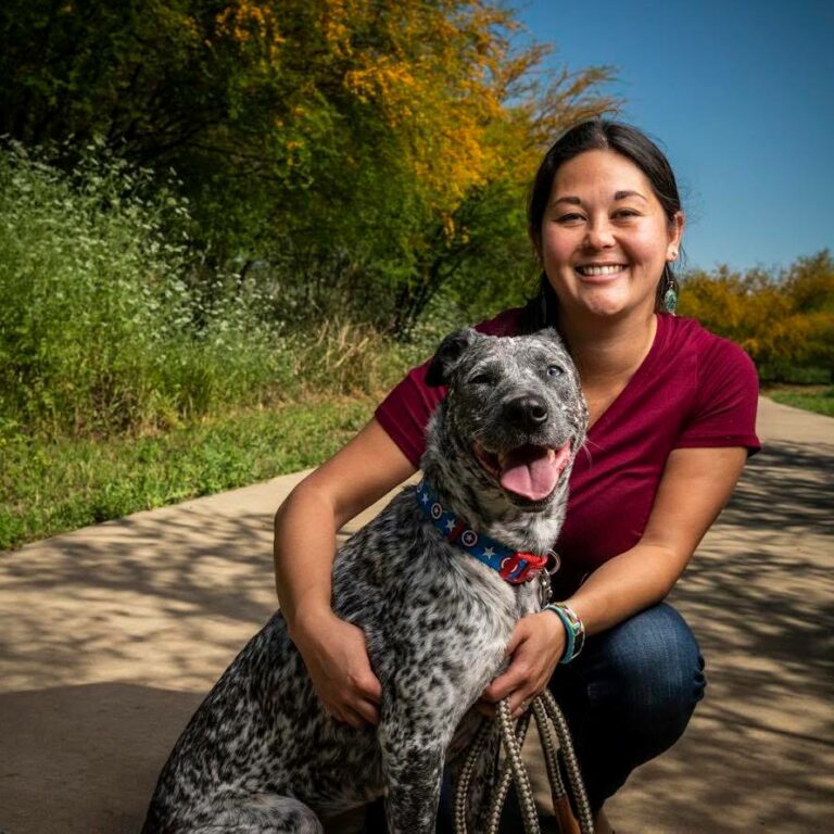 Clare Callison headshot with dog