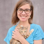 Dr. Ellen Jefferson holding small tabby cat
