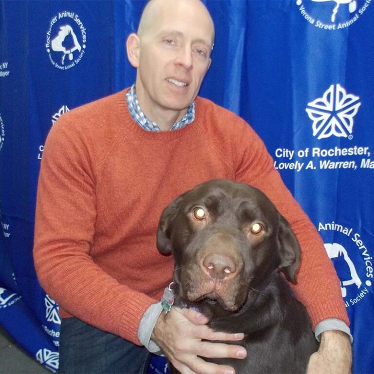 Chris Fitzgerald with Keeva, a brown dog