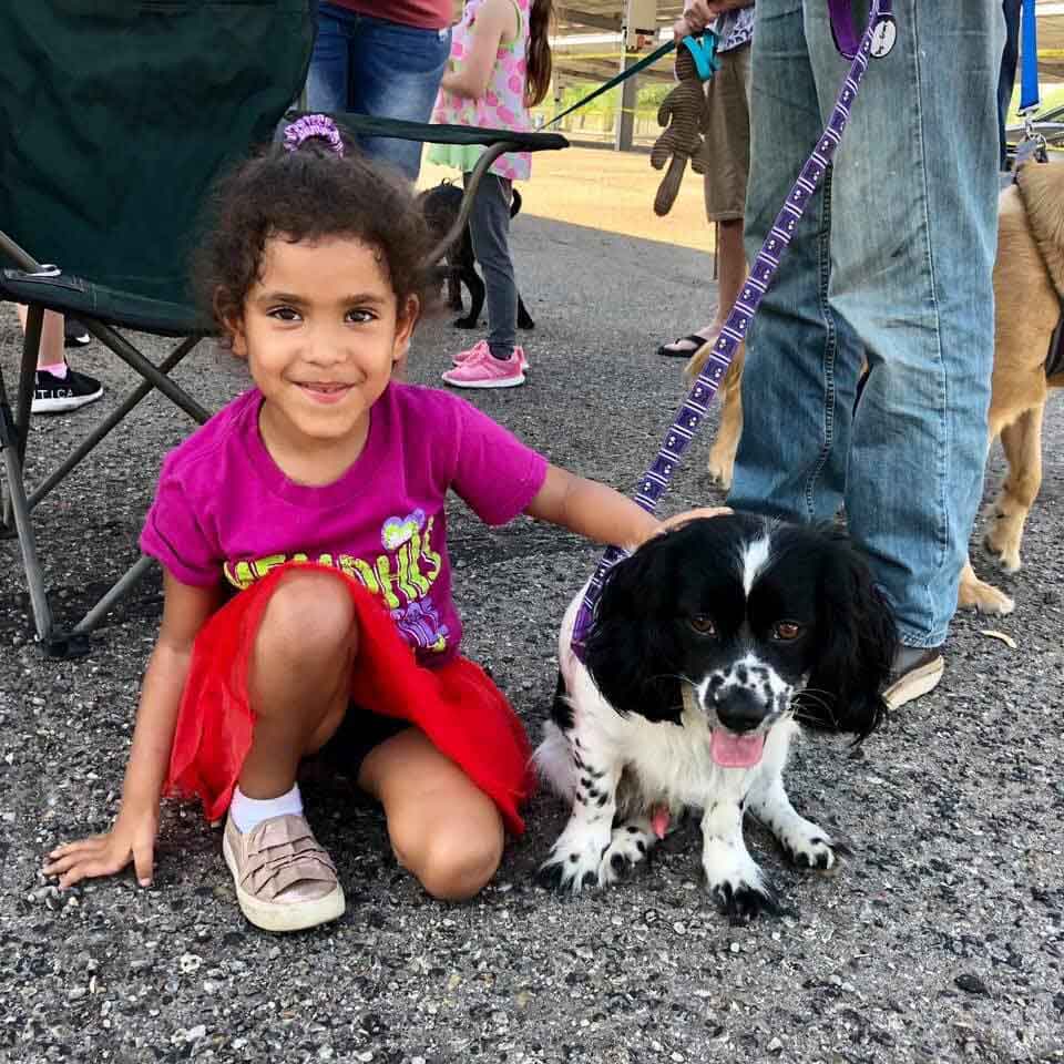 Little girl with dog
